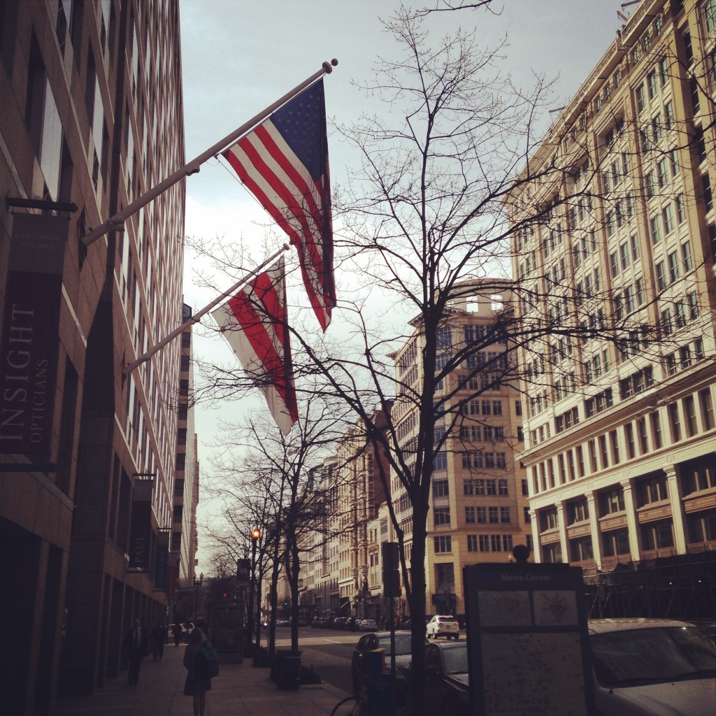 Flags flying in the balmy spring air on F Street in Washington, DC