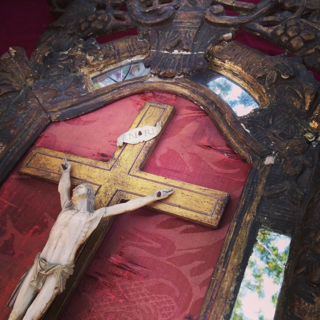 A quietly elegant, framed crucifix from a Paris flea market