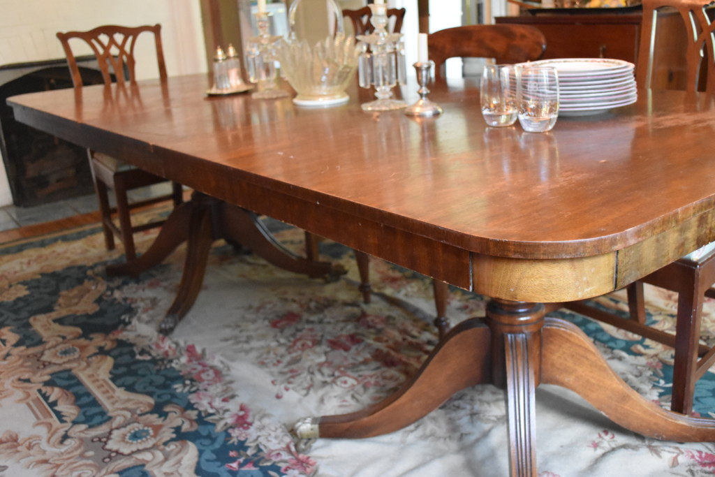 This beautiful mahogany dining table is from Belgium and comfortably seats 10.