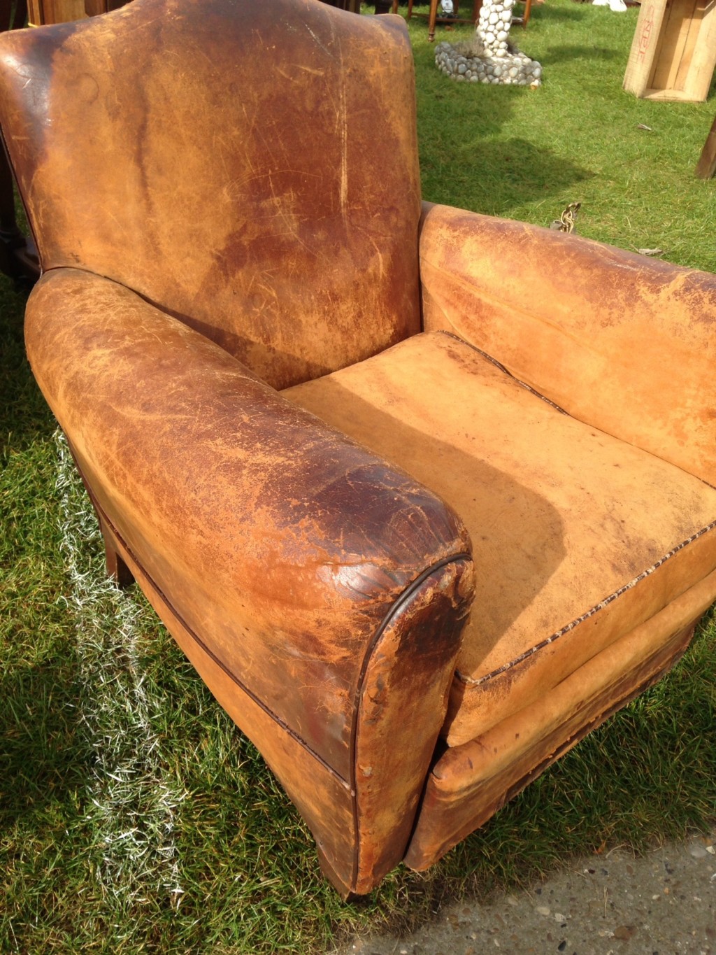A genuine, leather, French club chair. Its a perfect specimen.