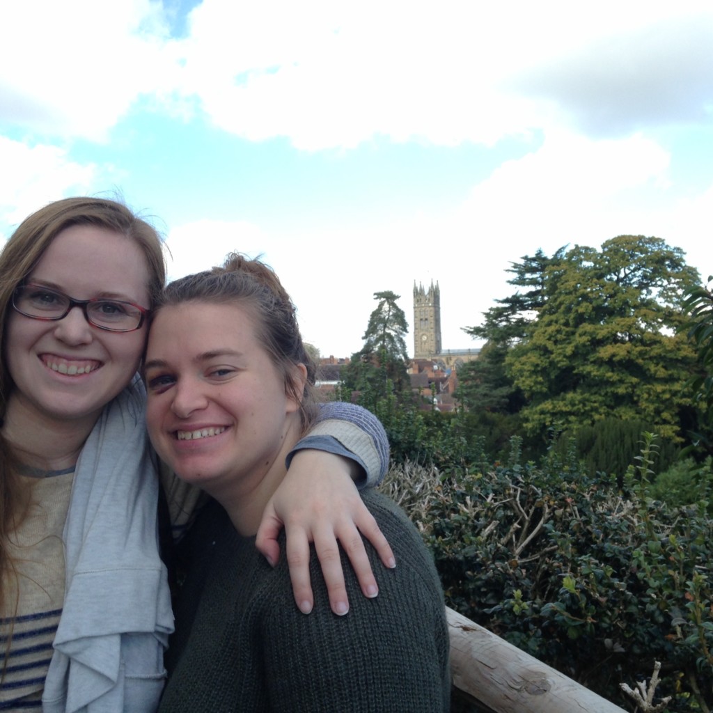 One of my favorite things about the British landscape: castles. Here are the girls on the walls of Warwick Castle, with the town and church in the background.