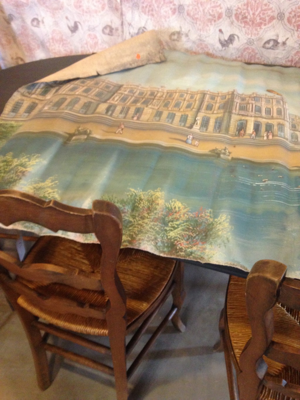 This piece just tickles me. It's a 4' wide canvas depicting Versailles circa 1900. I'm not sure if it's a prop or promotional image. But it's just so cool!