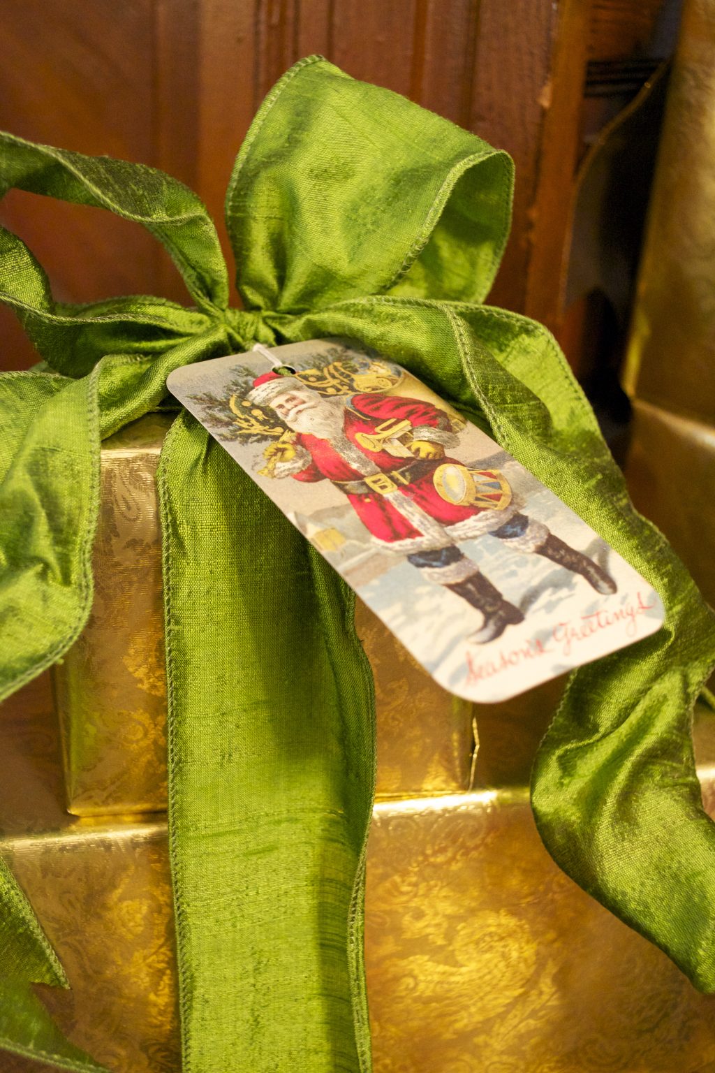 The silk duponi ribbon makes this stack of golden packages shine.